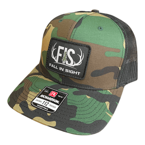 Camo trucker hat with a FIS logo patch