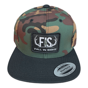 Black and camo flatbill trucker hat with a FIS patch on the front