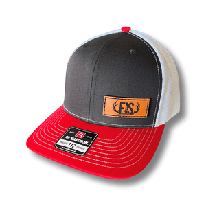Trucker hat with red bill and black front with small leather FIS patch