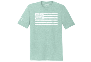 Mint colored tee shirt with an American flag on the front